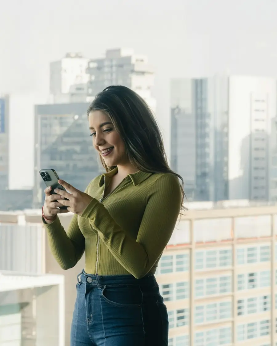 A condo resident using the Koti app on their phone